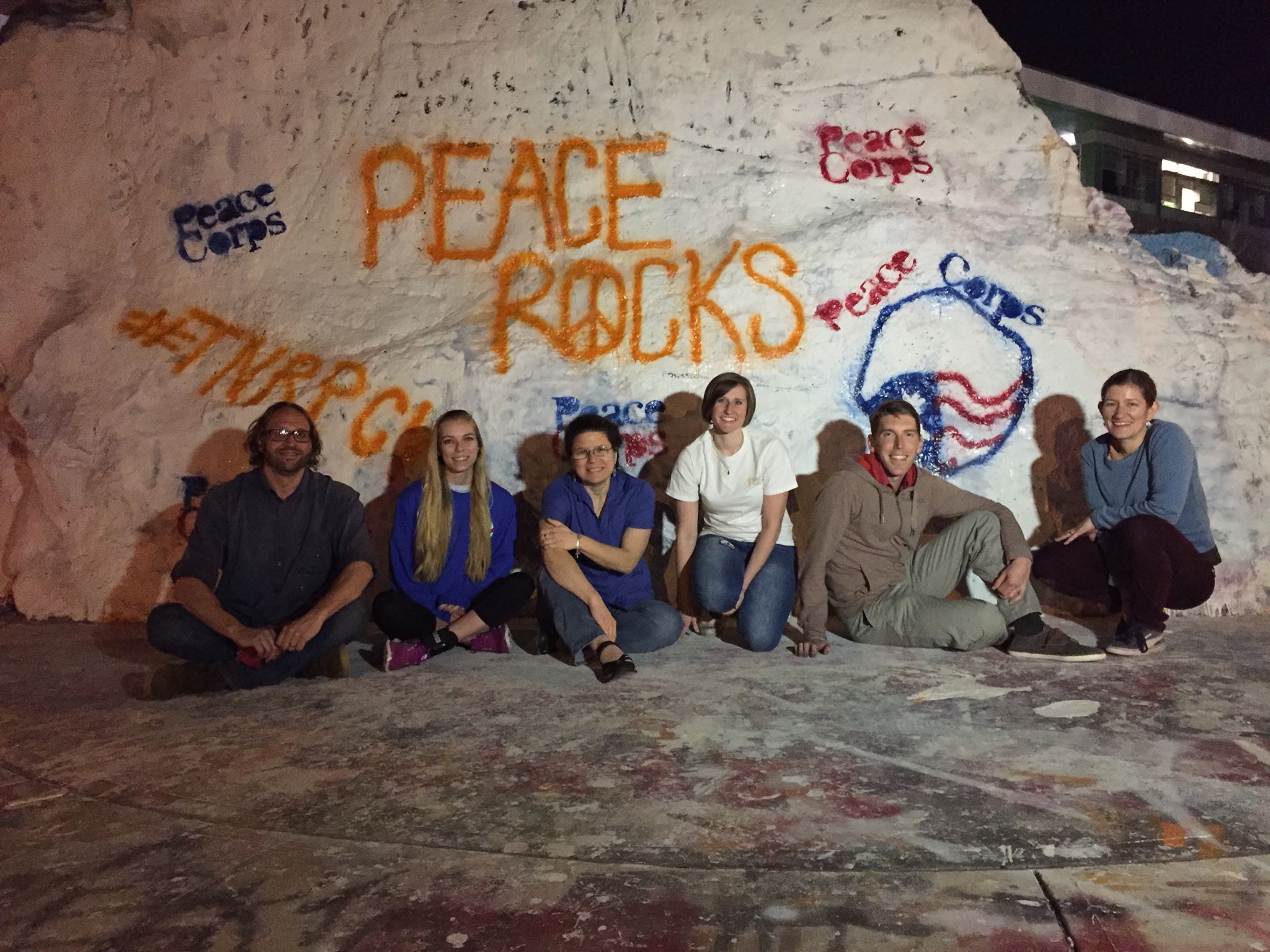 Photograph of returned Peace Corps volunteers by the Rock