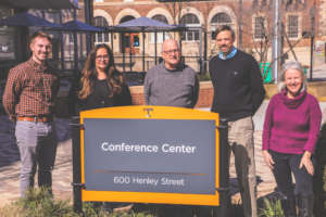 English Language Institute staff members pictured in downtown Knoxville in front of the UT Conference Center Building